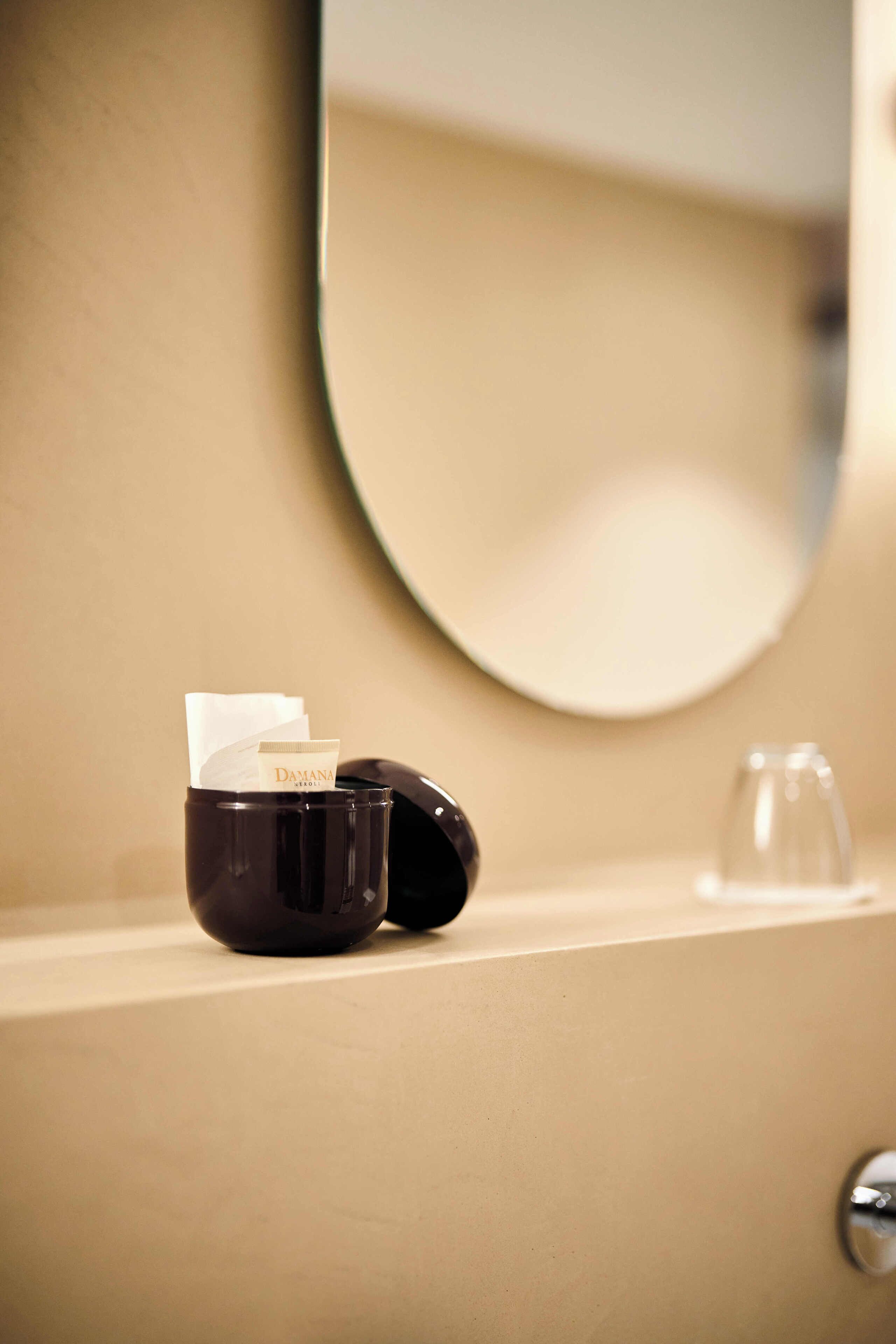 hair dryer, bathrobes, slippers, towels