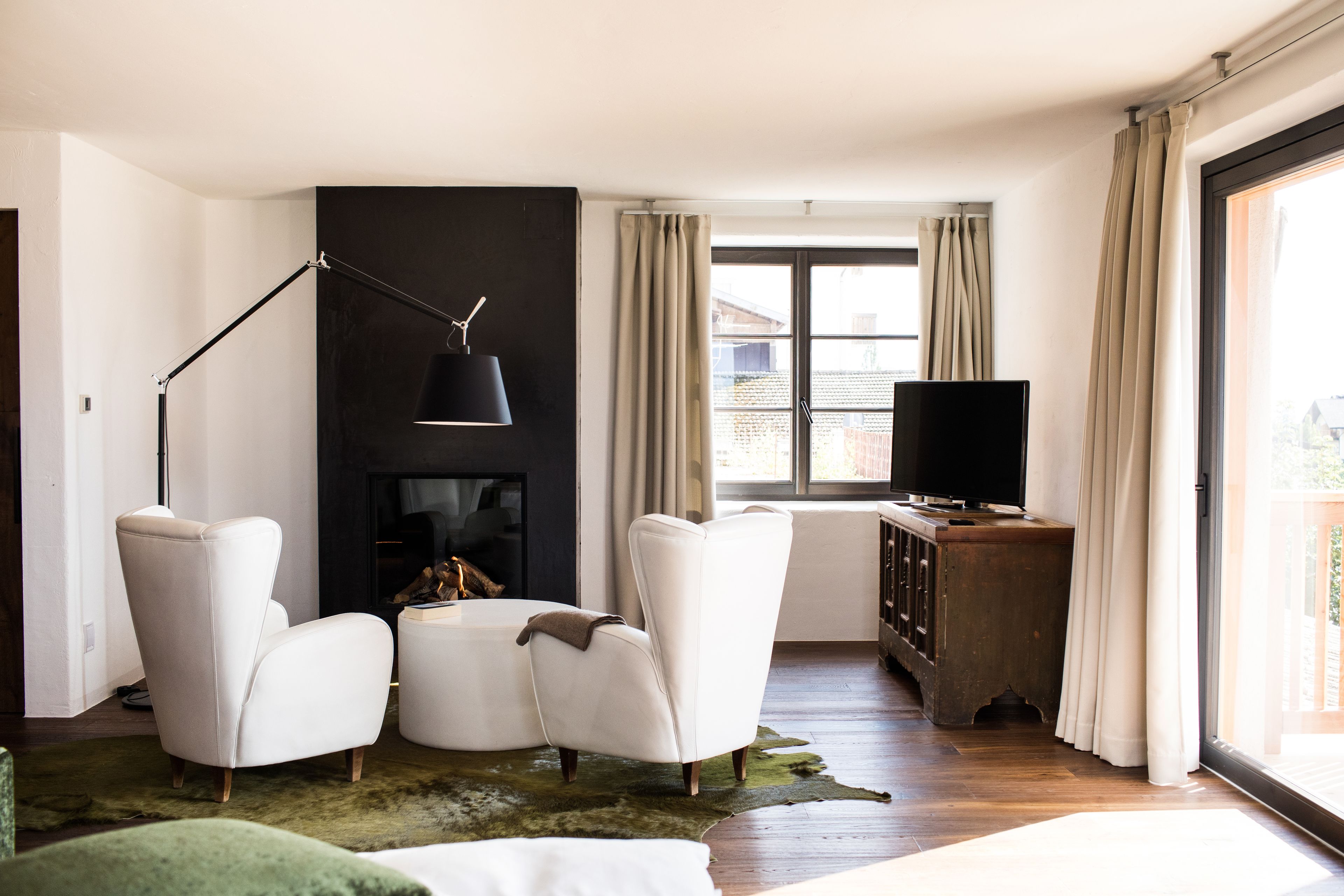 suite | living area | tv, heated floors