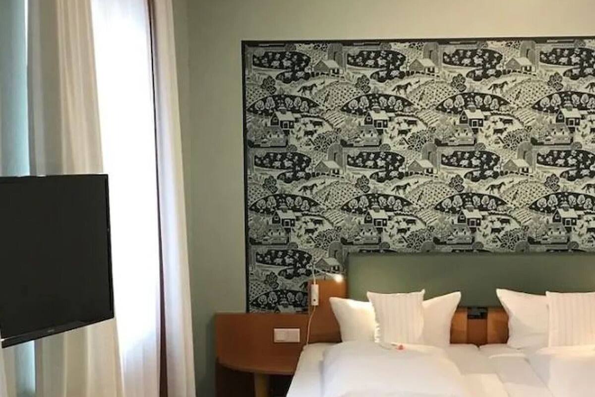 exclusive suite | premium bedding, down duvets, in-room safe, individually decorated