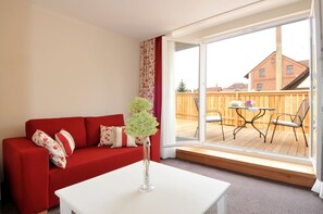 Exclusive Studio Suite, Terrace (Penthouse) | Living area | Flat-screen TV