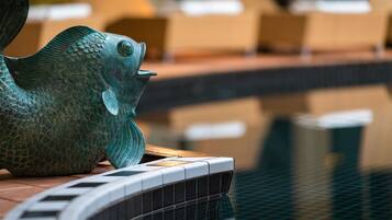 Indoor pool, open 7:00 AM to 10:00 PM, sun loungers