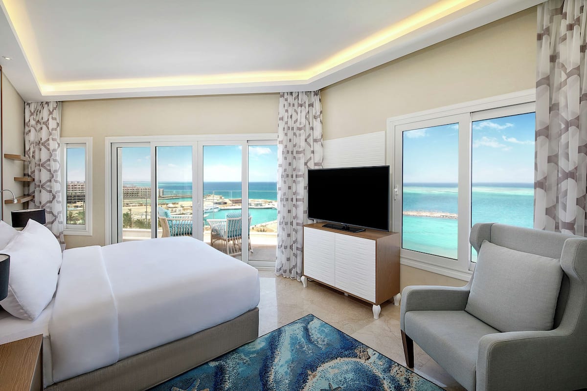 Suite, 1 King Bed, Kitchenette, Sea View (Blue Bay) | Hypo-allergenic bedding, minibar, in-room safe, blackout curtains