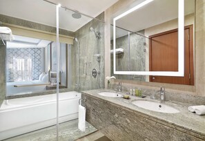 Superior Room, 1 King Bed, Balcony, Sea View | Bathroom | Combined shower/tub, deep soaking tub, hair dryer, towels - Hilton Hurghada Plaza (Hurghada)