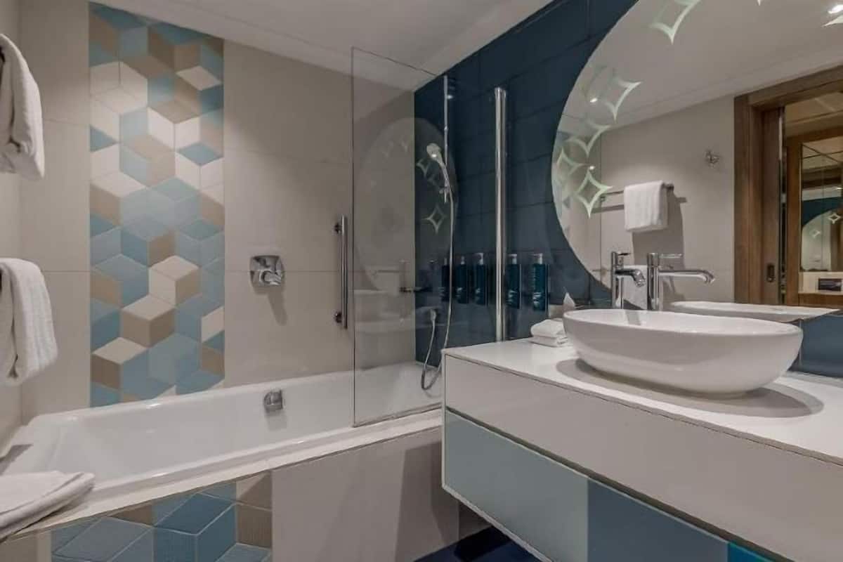 Bathroom | Designer toiletries, hair dryer, towels