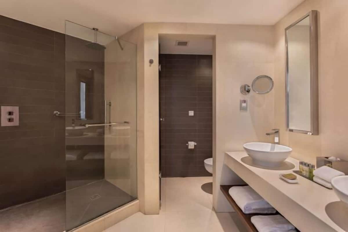 Bathroom | Designer toiletries, hair dryer, towels