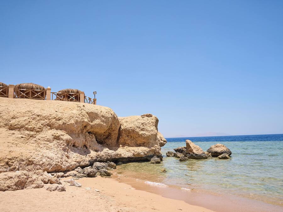 Playa privada, sombrillas, toallas de playa, masajes en la playa