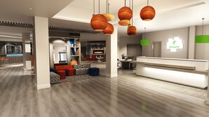 A modern hotel lobby with a reception desk, seating area with colorful cushions, and a kitchen in the background. - Holiday Inn Corby Kettering Hotel & Spa (Corby)