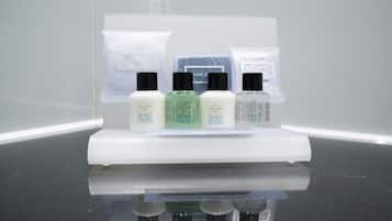 A display of skincare products on a white stand.