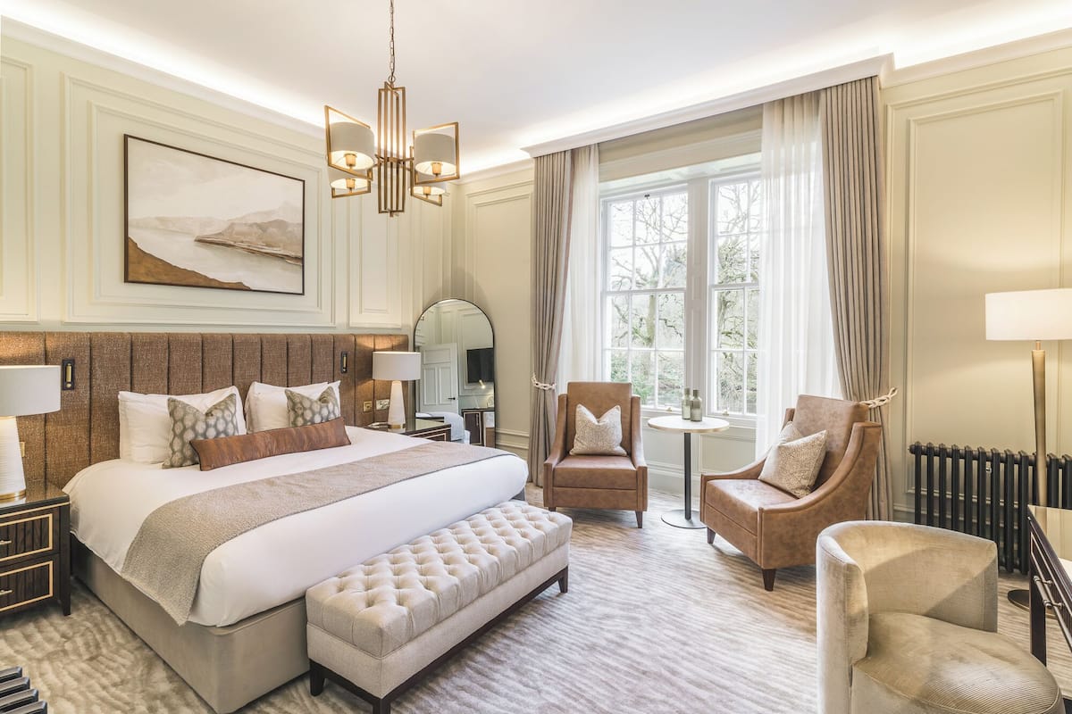 Premier Studio Suite | Individually decorated, desk, laptop workspace, iron/ironing board