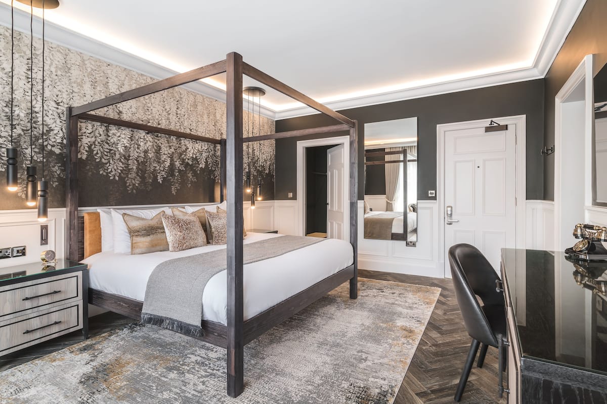 Douglas Suite | Individually decorated, desk, laptop workspace, iron/ironing board