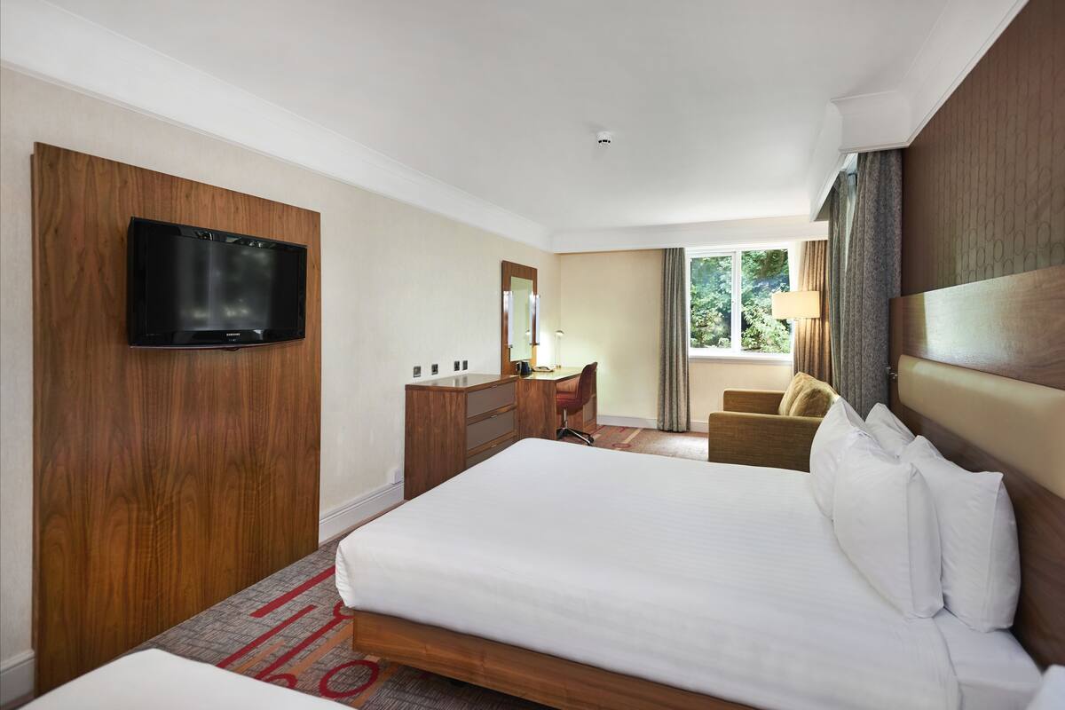 Hypo-allergenic bedding available, in-room safe, desk, laptop workspace