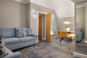 Premium Suite, 1 King Bed with Sofa bed | Living area | Smart TV