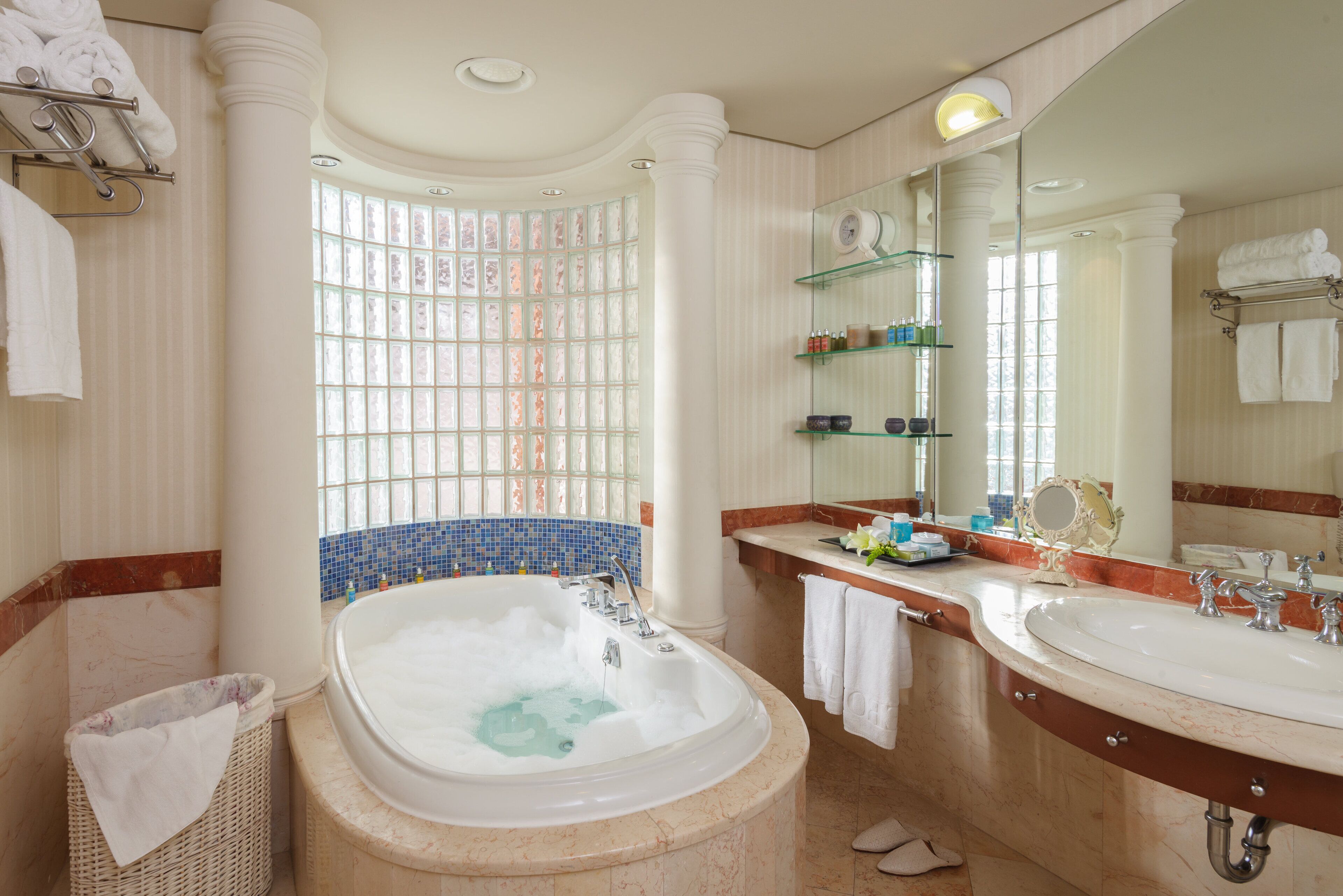 presidential suite | bathroom | combined shower/bathtub, designer toiletries, hair dryer, bathrobes