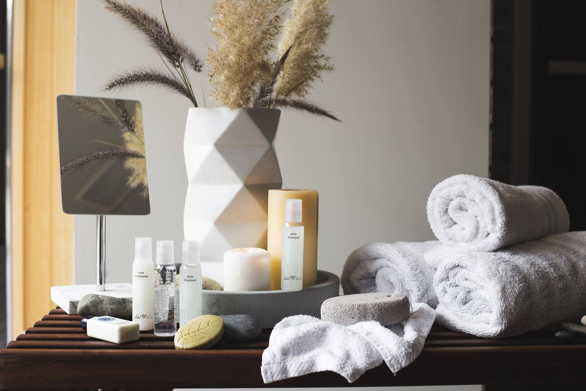 combined shower/bathtub, designer toiletries, hair dryer, bathrobes