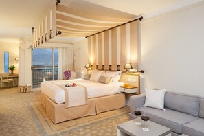Premium bedding, pillowtop beds, minibar, in-room safe