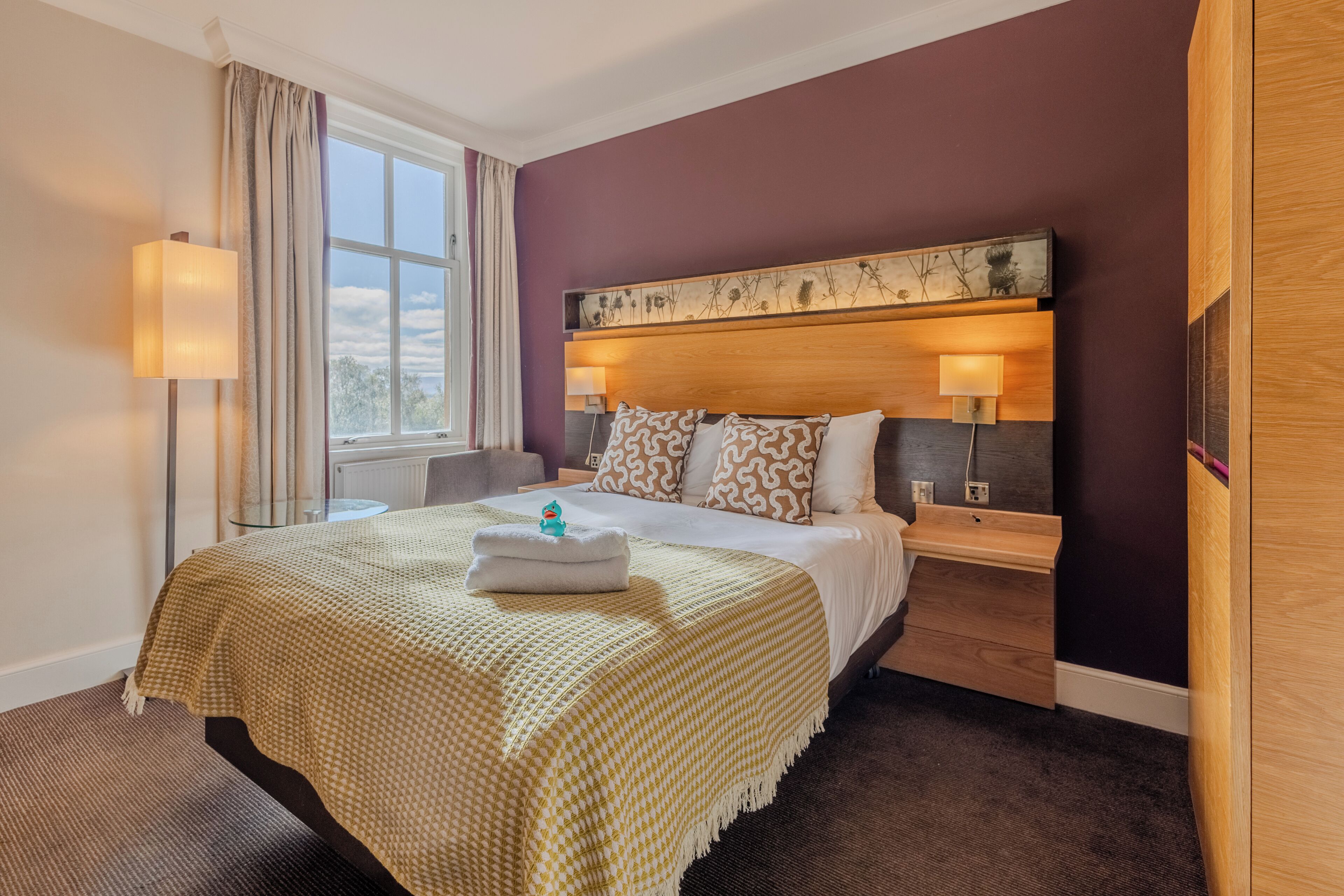 Interconnecting Family Room | In-room safe, desk, laptop workspace, blackout drapes