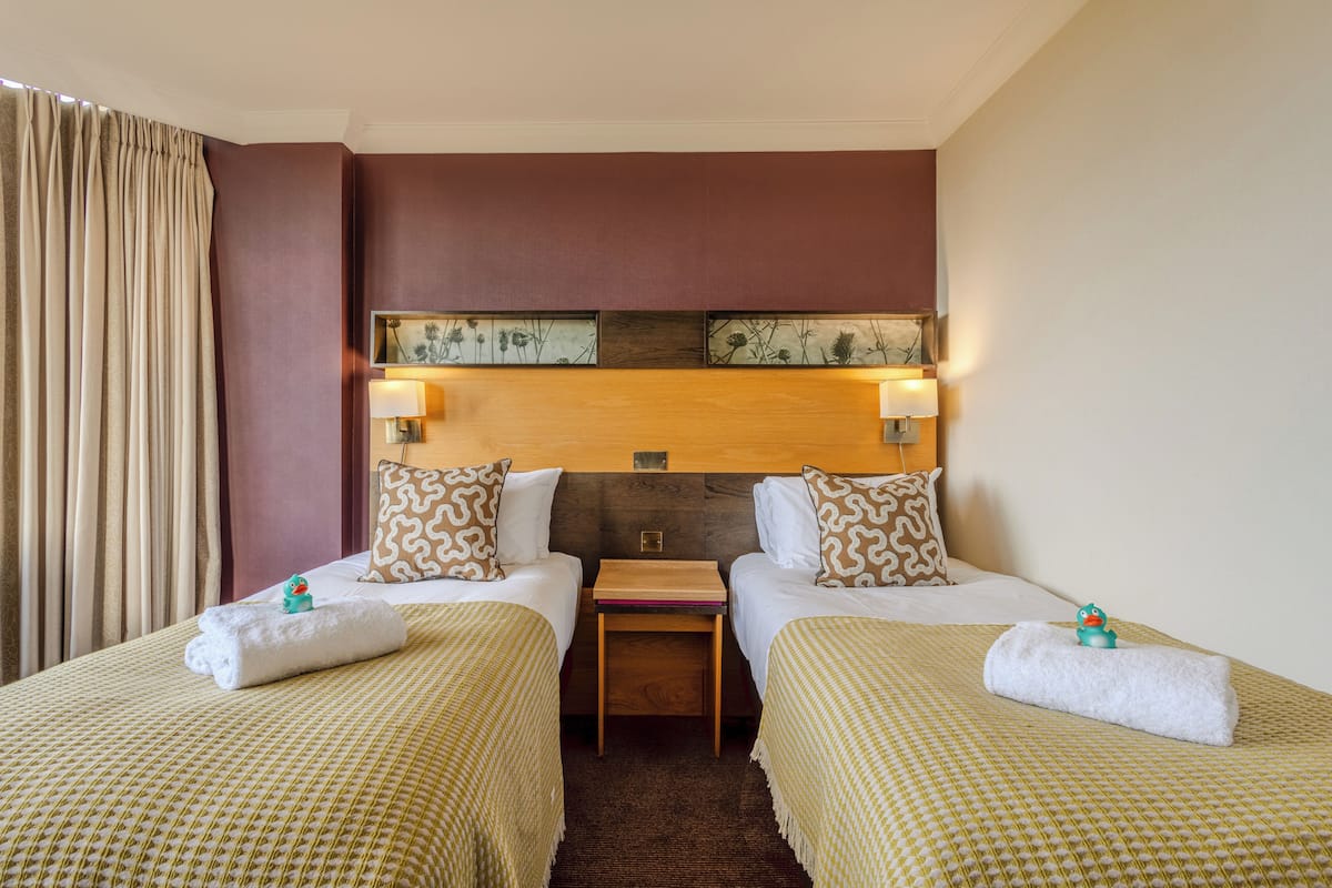 In-room safe, desk, laptop workspace, blackout curtains