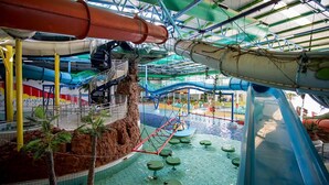 An indoor water park with slides, a climbing wall, and a pool area. - Best Western Stoke on Trent City Centre Hotel (Stoke-on-Trent)