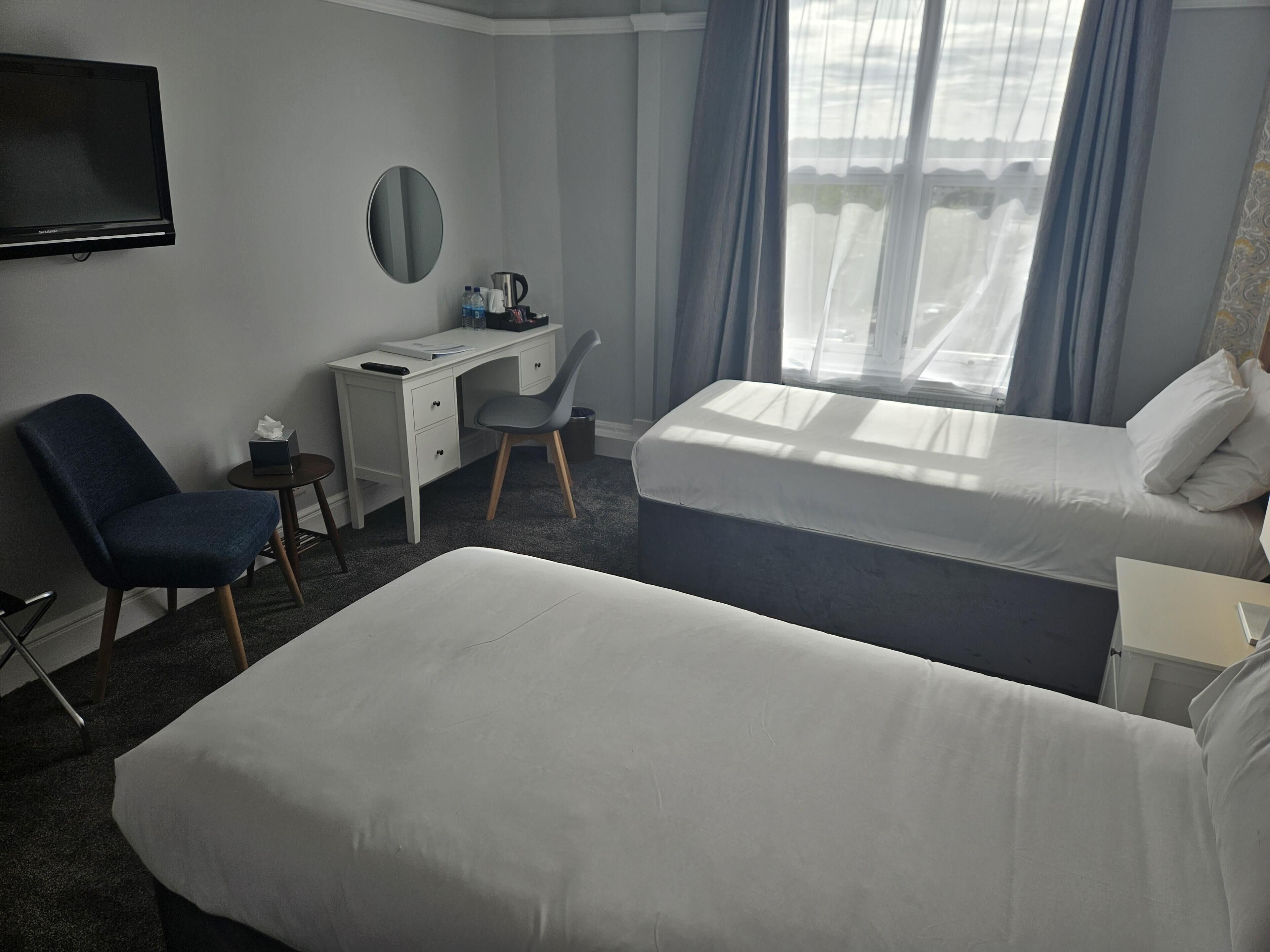Desk, iron/ironing board, WiFi (free), alarm clocks