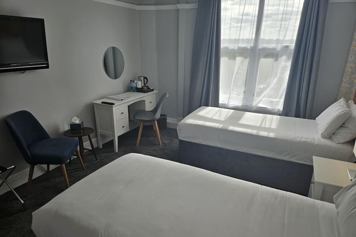 Desk, iron/ironing board, WiFi (free), alarm clocks