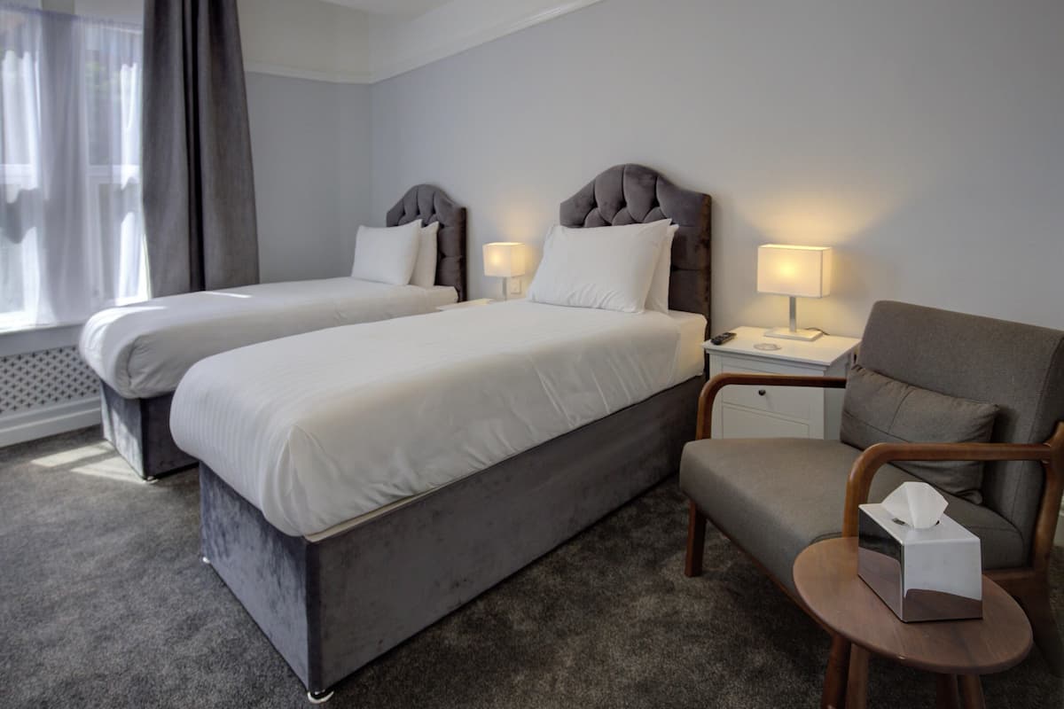 Desk, iron/ironing board, WiFi (free), alarm clocks