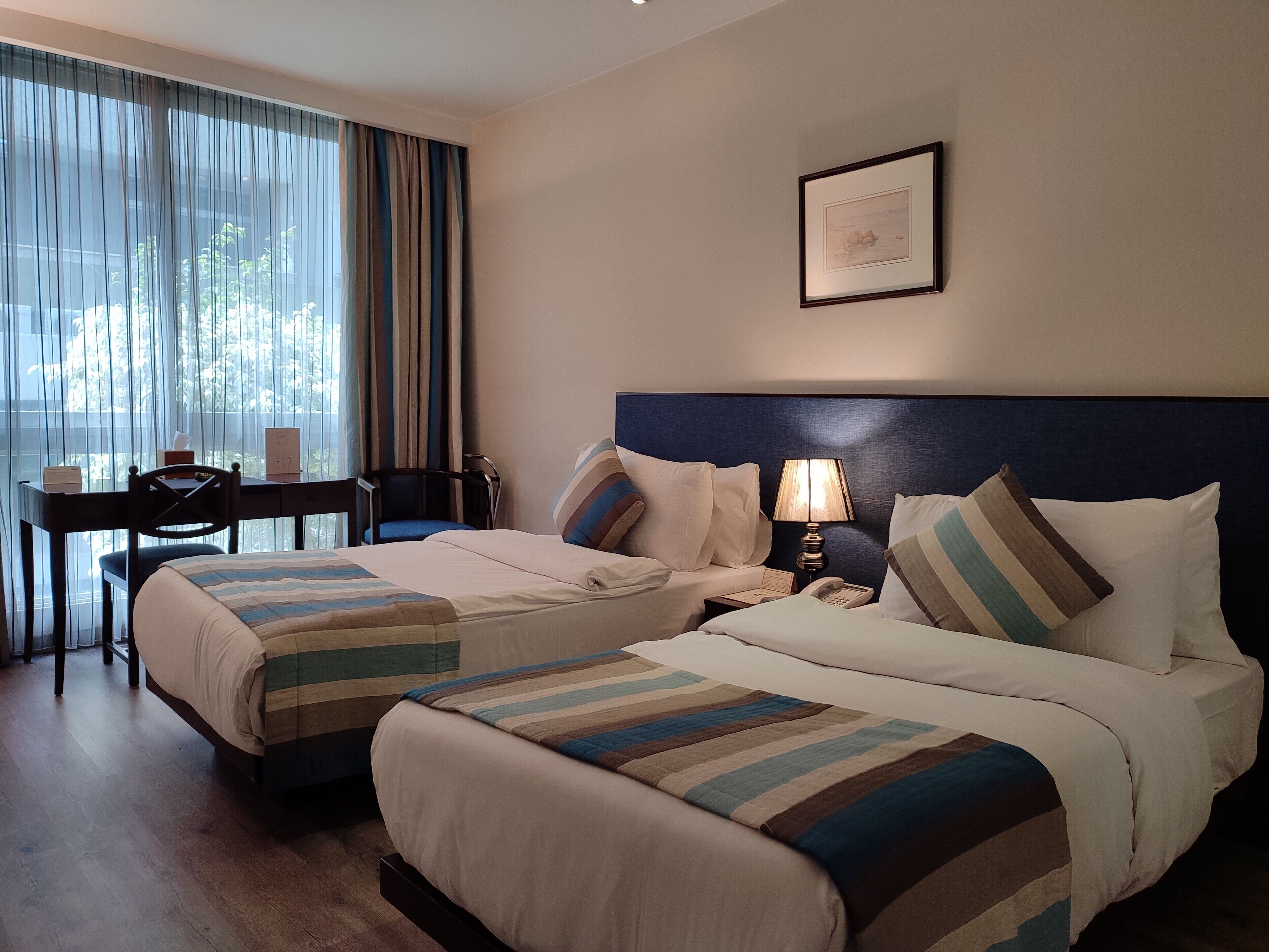 Deluxe Room, City View | Egyptian cotton sheets, premium bedding, memory foam beds, minibar
