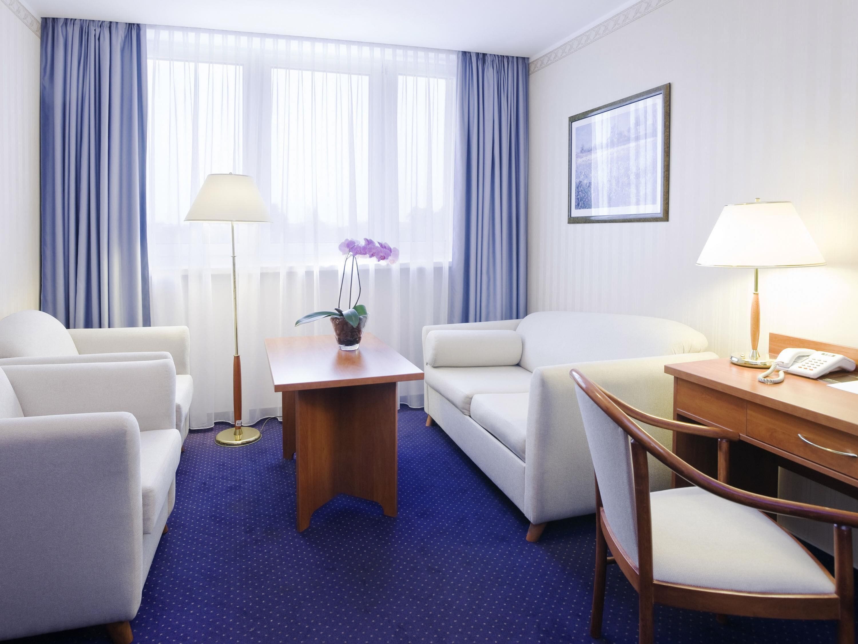 deluxe suite, 1 king bed with sofa bed | minibar, desk, laptop workspace, soundproofing