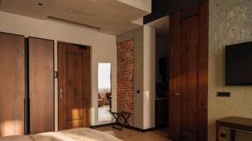 Deluxe kamer, kitchenette | Luxe beddengoed, donsdekens, bedden met traagschuimmatrassen