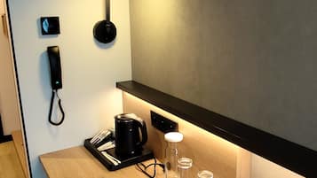 Desk, laptop workspace, blackout drapes, free cribs/infant beds