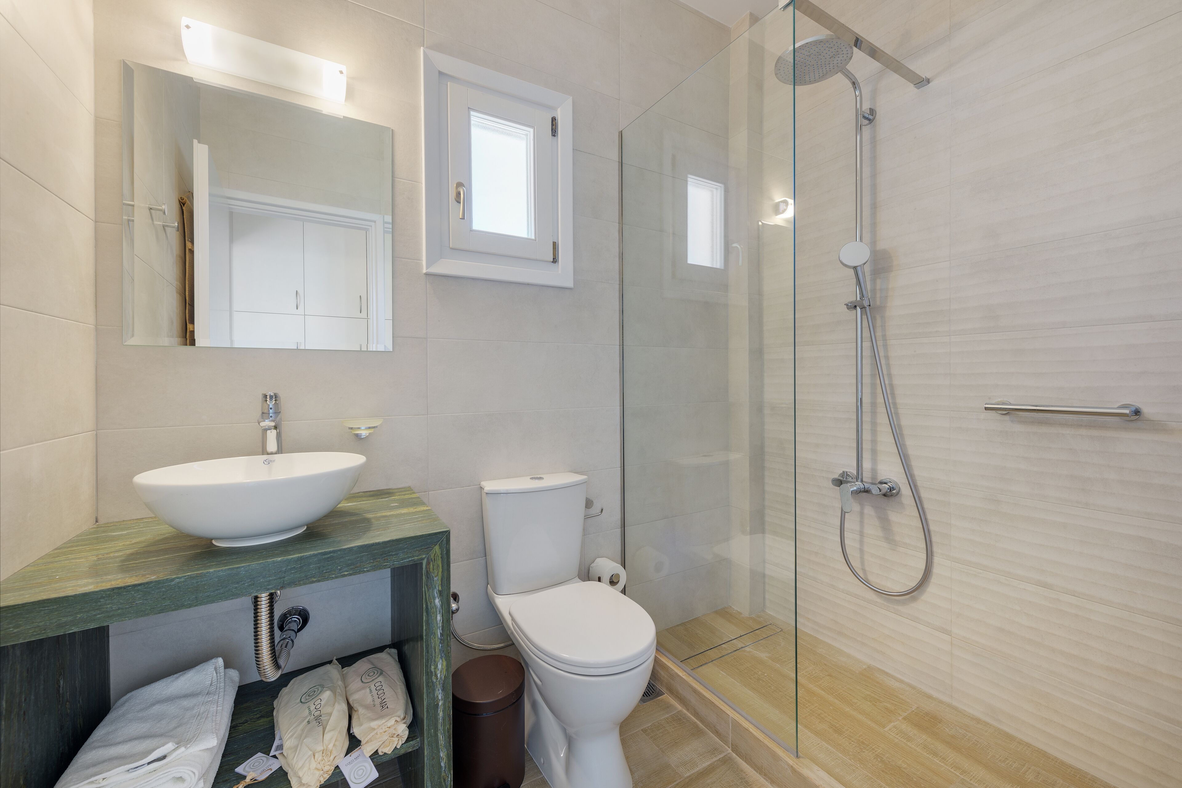 the dolphin bay suite with panoramic sea view | bathroom | shower, free toiletries, hair dryer, slippers