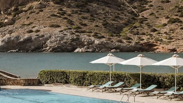 Outdoor pool, pool umbrellas, pool loungers