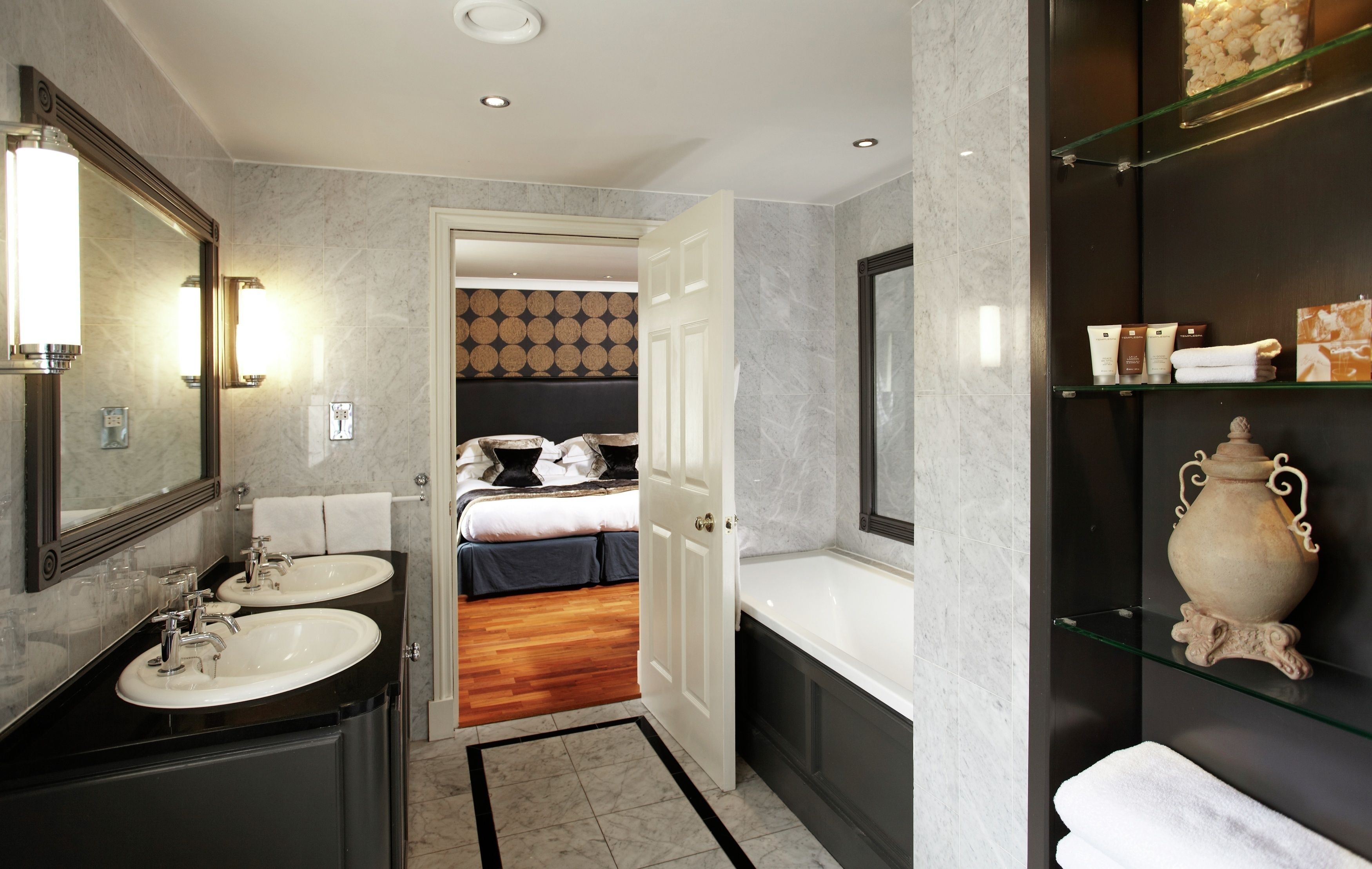 junior suite | bathroom | designer toiletries, hair dryer, bathrobes, slippers