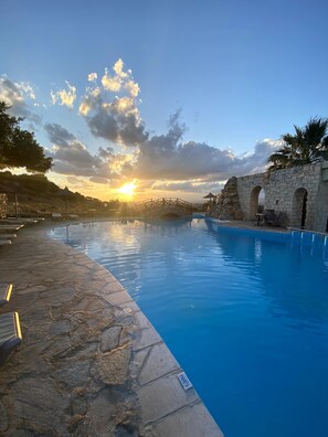 Outdoor pool, pool umbrellas, pool loungers