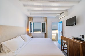 Habitación estándar, vista al mar | Sábanas de algodón egipcio, ropa de cama de alta calidad y edredón