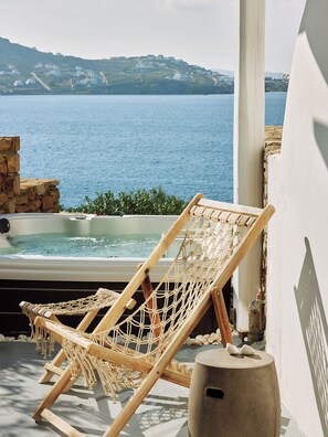 Dúplex familiar, hidromasaje, vista al mar | Ropa de cama de alta calidad y minibar 