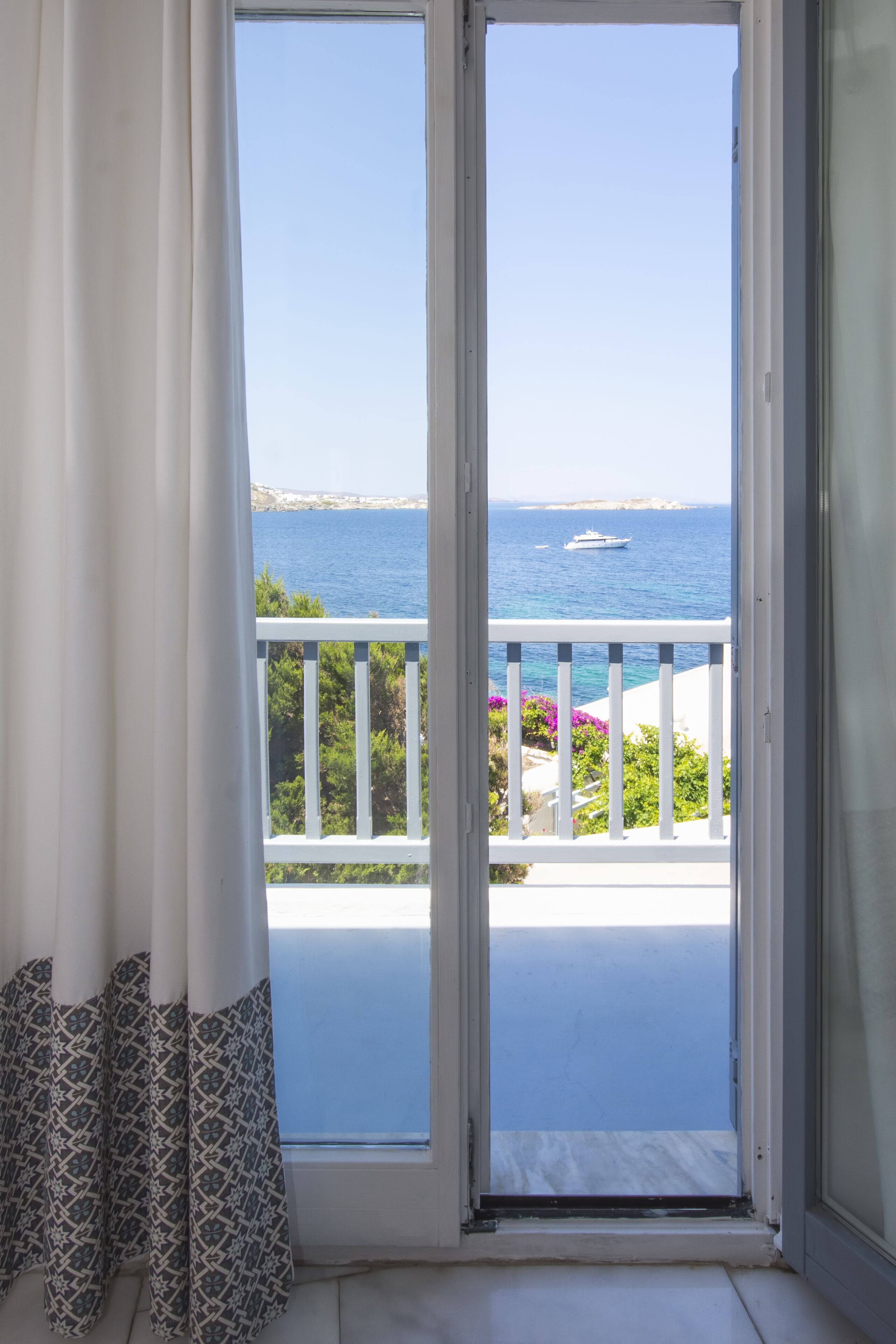 superior room, sea view | premium bedding, minibar, in-room safe, iron/ironing board