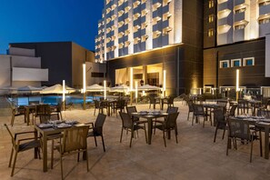 Outdoor pool, open 7:00 AM to 9:30 PM, pool umbrellas, pool loungers - Wyndham Bukhara (Bukhara)