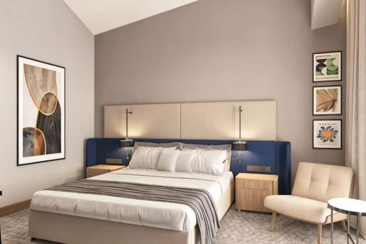 Colchones con pillow-top, minibar y caja de seguridad en la habitación
