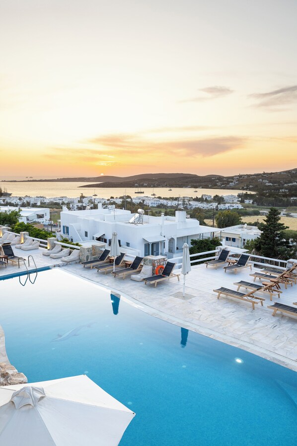 Outdoor pool, pool umbrellas, pool loungers