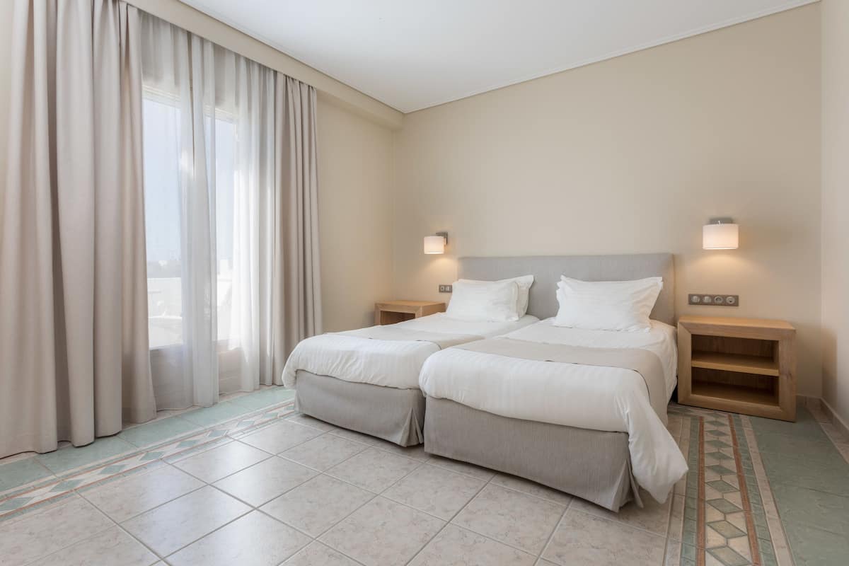 Superior Room, Garden View | Premium bedding, minibar, in-room safe, desk