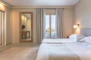 Suite familiar (2 Interconnecting double rooms) | Ropa de cama de alta calidad y minibar 