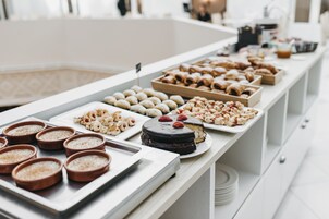 Daily buffet breakfast (EUR 18 per person)