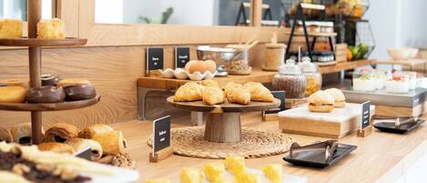 Daily buffet breakfast (EUR 18 per person)
