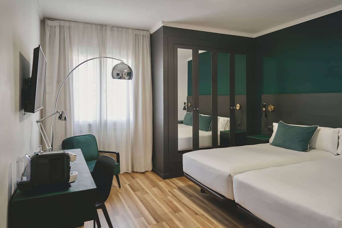 Ropa de cama de alta calidad y minibar