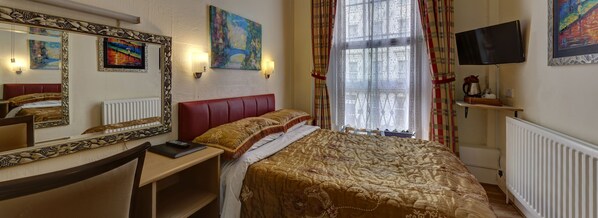 Desk, blackout drapes, iron/ironing board, free WiFi