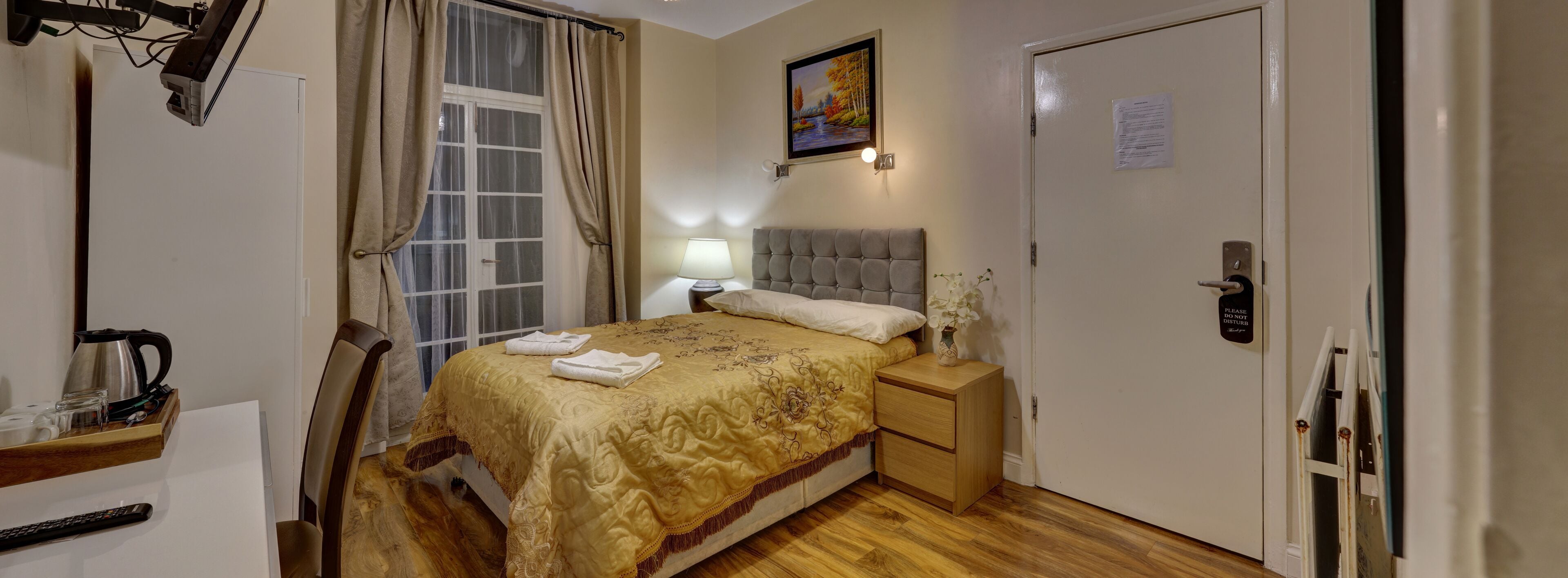 Desk, blackout drapes, iron/ironing board (on request), WiFi (free)