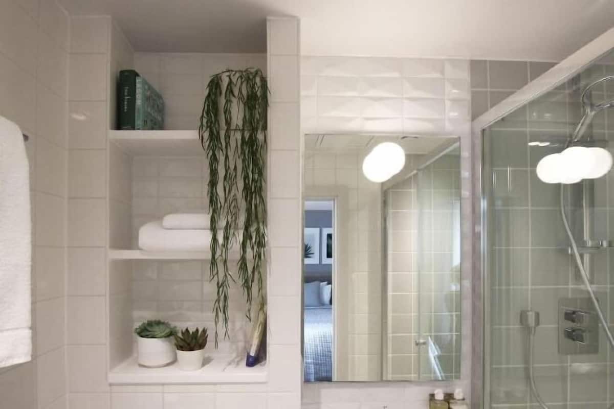 Bathroom | Designer toiletries, hair dryer, bathrobes, towels