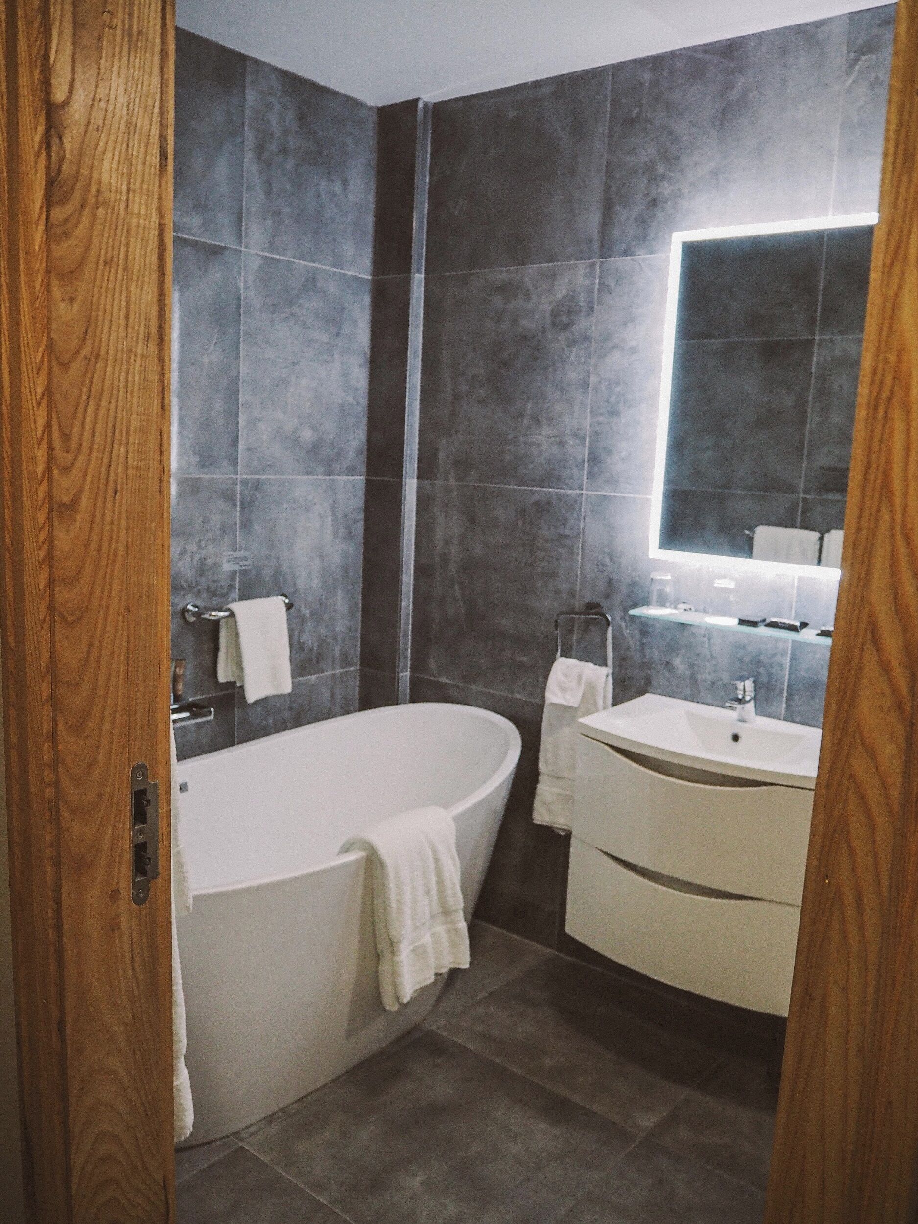 junior suite | bathroom | hair dryer, towels
