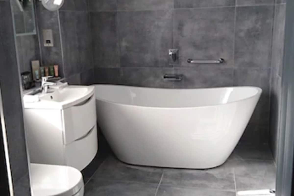 the tribes suite | bathroom | hair dryer, towels