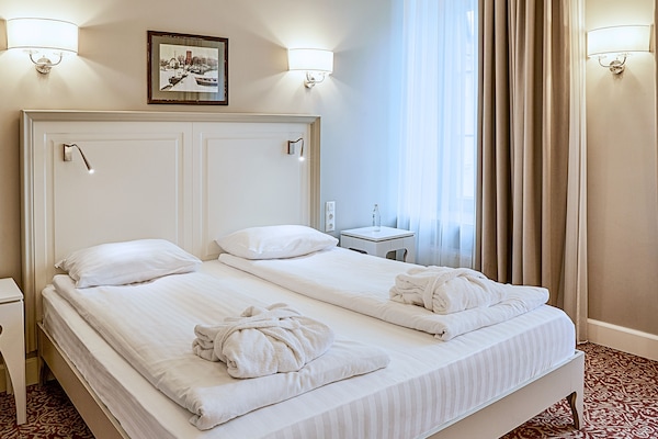 Ropa de cama hipoalergénica y minibar